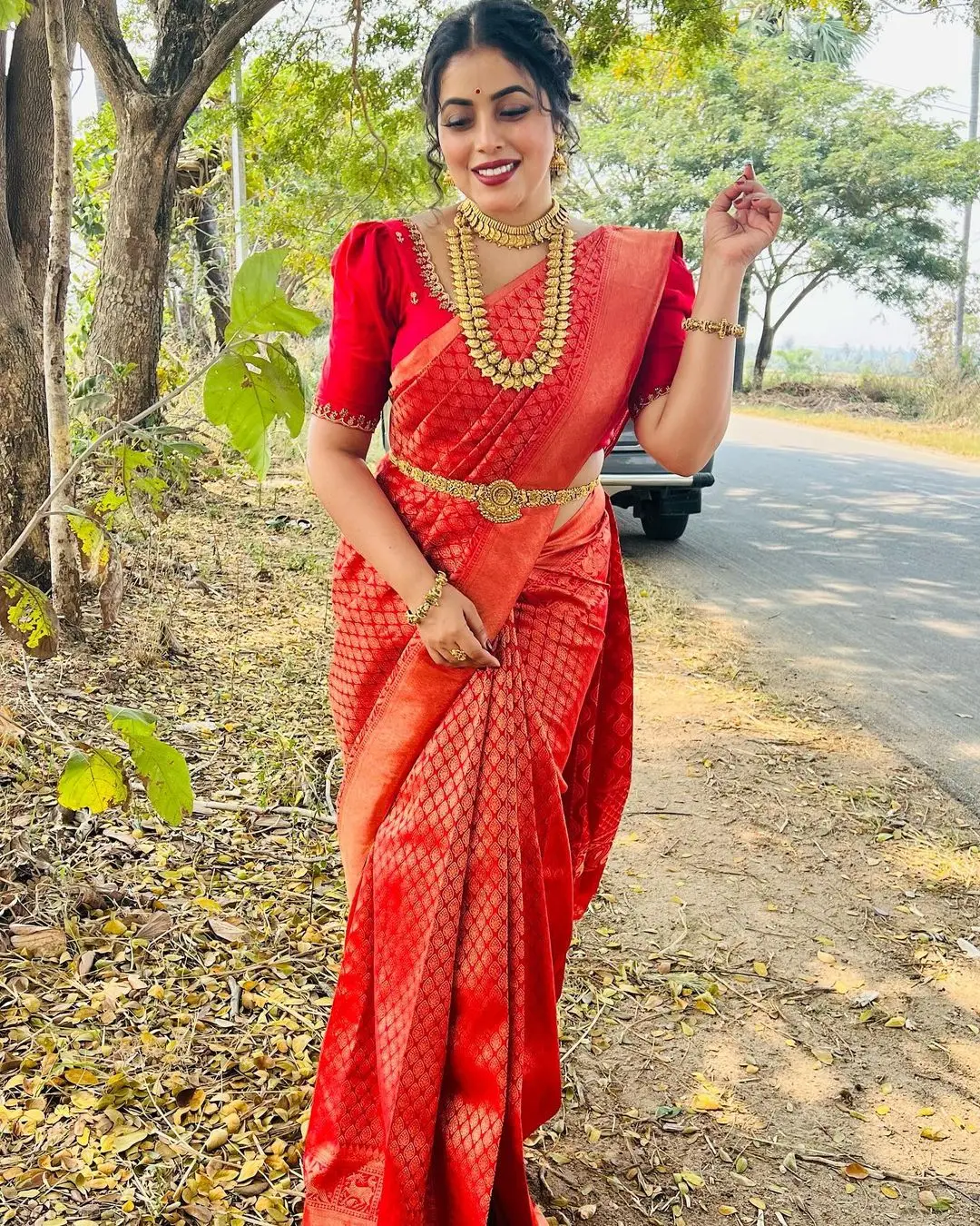 Shamna Kasim Wearing Beautiful Jewellery Orange Saree